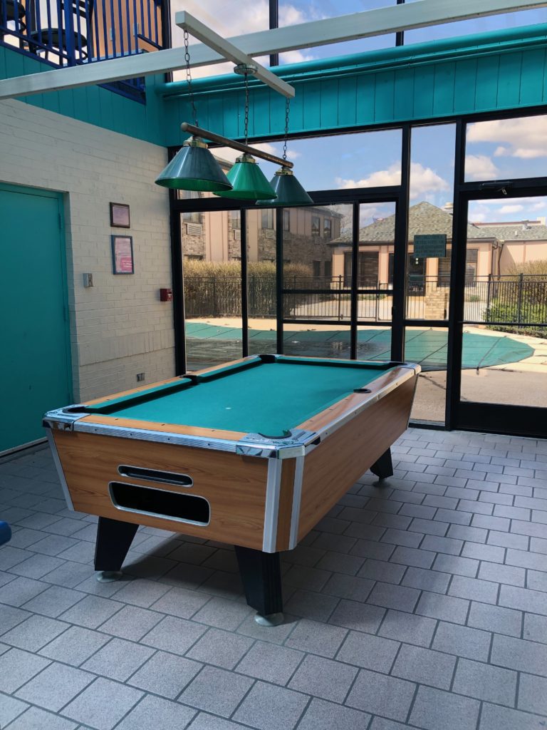 Pool table and seasonal outdoor pool