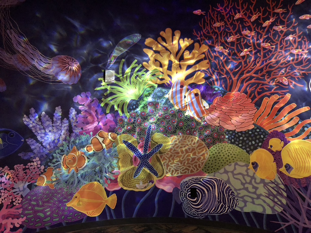 Coral reef mural inside the Tropical Diver Gallery at the Georgia Aquarium