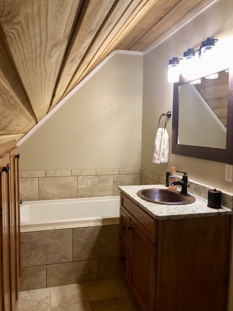 Master en suite vanity and soaking tub.