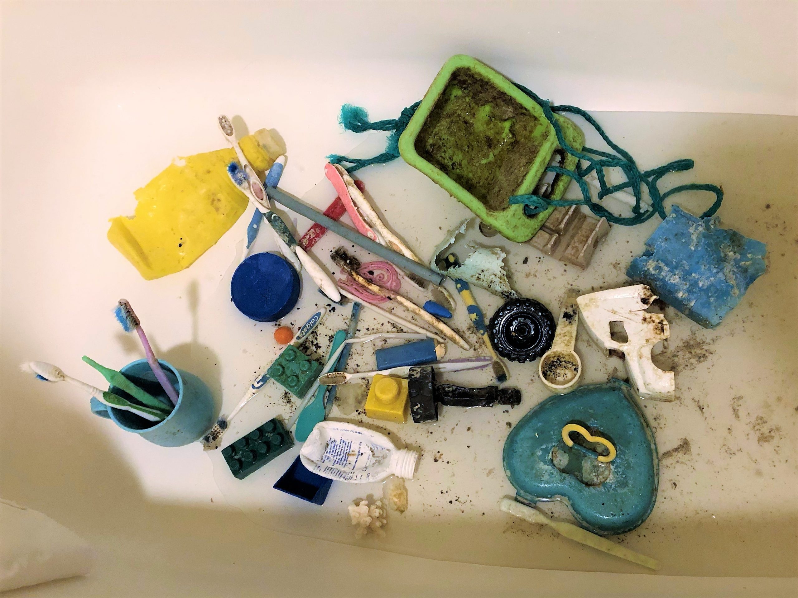 Plastic marine debris pieces, including toothbrushes and toys, that were found during our visit. 