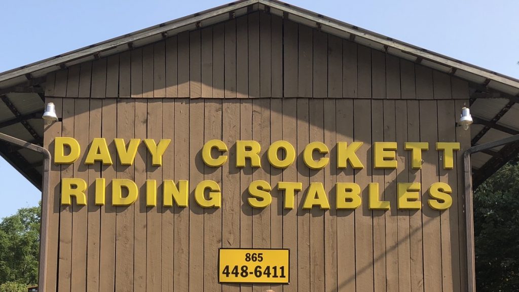 Davy Crockett Riding Stables sign.
