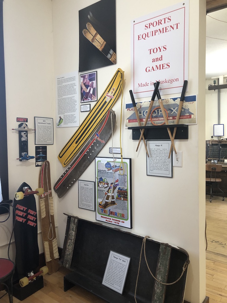 A museum display all about the first snowboard, the Snurfer. 