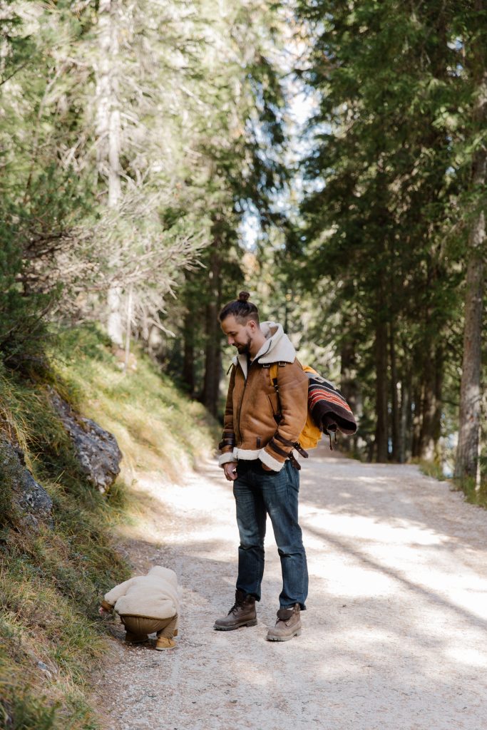 Father and son on a hike. Multigenerational vacation tips - Take every age into account.