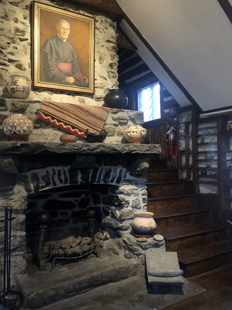 Stone fireplace inside the Hiwan Heritage Museum, Evergreen, CO